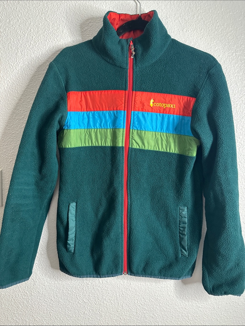 cotopaxi Teal Fleece Jacket with Red, Blue & Green Stripes